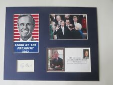 George W.H. Bush sworn in as President and his autograph picture
