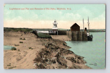 1911. WOLFVILLE, N.S. LIGHTHOUSE. PIER. POSTCARD CK30 picture