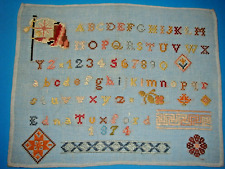 Antique alphabet sampler by Edna Tuxford dated  1874 picture