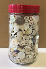 6 INCH GLASS COFFEE JAR FULL OF VINTAGE SALVAGED BUTTONS-MOSTLY SHADES OF WHITE picture
