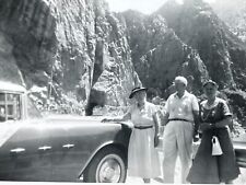 RC Photograph Old Man Women Pose With  Cool Old Car Picturesque Rocky Outcrops picture