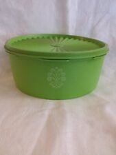 tupperware round container with lid, green color picture