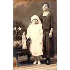 Vintage Postcard RPPC Woman With Young Girl Religious Statue Lilies 1900s AZO picture