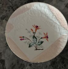 Vintage plate with napkin & basketweave flower decorations marked on back picture