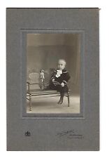 Late 1800's Portrait of Young Boy Sitting on a Chair picture