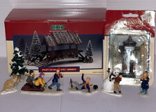 Lemax, 6 figurines, 1 Kiosk, 1 Wooden Bridge With Tree’s. Sold Together As A Lot picture