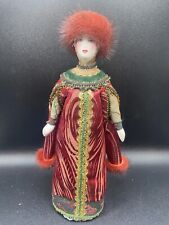Russian Porcelain Doll in Traditional Folk Dress picture