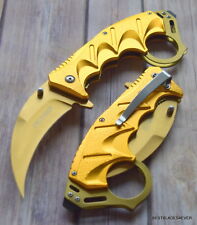 TACFORCE SPRING ASSISTED GOLD FINISH KARAMBIT KNIFE WITH POCKET CLIP - 8.75 INCH picture