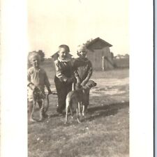 c1920s Cute Dog Handsome Little Boys RPPC Outdoors Play Farm Outhouse Photo A142 picture