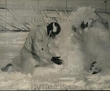 1961 Press Photo Snow Keeps Vikings' Ray Hayes & Jim Marshall Warm at Workout picture