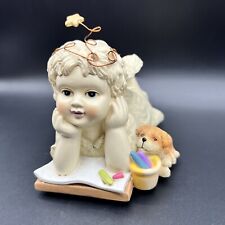Angel with Puppy Musical Figurine Plays Memory by T.S Eliot picture