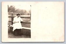 c1913 RPPC Lady on Bench Doing Stitch Work in Her Lap ANTIQUE Postcard 1332 picture