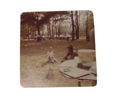 Vintage 1976 Found Photo Snapshot Art Child Man Hat Trees Park Cars Horseshoes picture