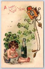 C1910 Postcard Happy New Year  Cherub, Clover, Champange & Dancing Clock picture