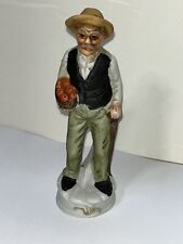 Vintage Elderly Man Holding Apples Bisque Porcelain Figurine made in Taiwan picture