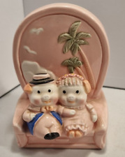 Anthropomorphic Pig Couple on Big Pink Chair  Money Box 12.5cm picture