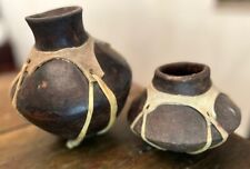 2 VINTAGE TARAHUMARA INDIAN WATER POTS WRAPPED IN RAWHIDE picture