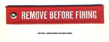 REMOVE BEFORE FIRING - RED KEYCHAIN - KEY008 picture