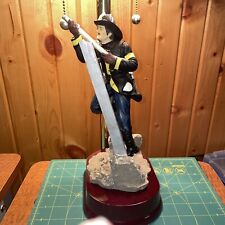 Firefighter With Hose On Ladder, 12”Tall Resin Statue  With 7