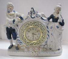 Vintage Porcelain Victorian Figural Battery Clock .. Works picture