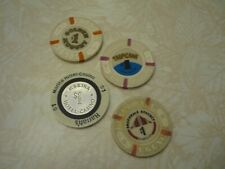 Four Vintage $1 casino poker chips picture