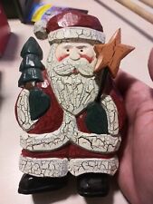 wood carved Santa Claus with Christmas tree and star picture