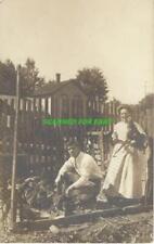 Man & Woman with Their Brown Chickens RPPC Unused Azo Early 1900's picture