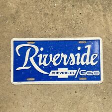 1970s Riverside Chevy Geo License Plate Booster Dealer Chevrolet Embossed Metal picture