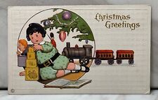 Postcard Christmas Greetings Embossed Girl Train Tree Blocks Book Toys USA Vtg picture