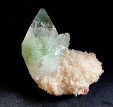 Apophyllite pointed light green crystal on Chalcedony picture