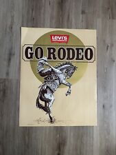 Vintage 1983 Levi’s Western Wear Go Rodeo Cowboy Advertising Poster 21x27 picture