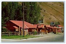 c1960's Wagon Wheel Lodge Rawhide Motel And Restaurant Jackson Wyoming Postcard picture