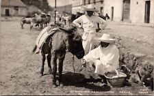 Osuna  Mexico Street View RPPC Burro Donkey Men Resting picture