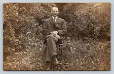 RPPC Man in Jacket Sits on Chair In a Country Setting VINTAGE Postcard 1370 picture
