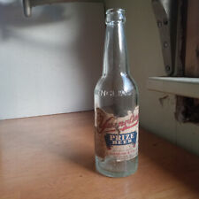 YUENGLING POTTSVILLE,PA EMB BOTTLE WITH 1933 DATED LABEL YUENGLING'S PRIZE BEER picture