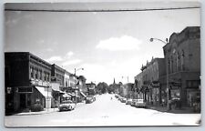 Horicon Wisconsin~Main Street~Rexall Drugs~Schneider Dry Goods~1950s Cars RPPC picture