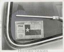 1966 Press Photo Texas Vehicle Inspection sticker. - hpa90869 picture