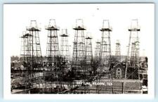 RPPC  KILGORE, Texas TX ~ Oil Wells SKYLINE Gregg & Rusk Counties 1940s Postcard picture