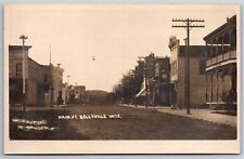 Belleville WI~Dirt Main Street~Hotel~Various Sized Utility Poles~c1907-15~RPPC picture