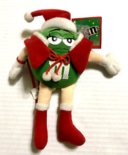 Ms. Green M&M's Candy Plush Red Christmas Santa Hat picture