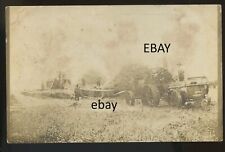 1915 circa. Six men bale hay. Tractor in foreground is steamer # 7  RPPC picture