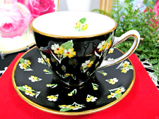 GLADSTONE tea cup and saucer black with Primrose flowers teacup painted picture