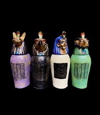 The Smallest Canopic jars made from heavy stone with the old touching picture