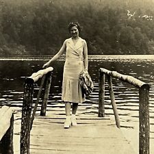 Vintage Snapshot Photograph Beautiful Young Woman Standing On Lake Dock picture