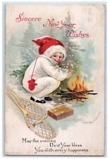 New Year Child Fire Burning Snow Shoes Ellen Clapsaddle Artist Signed Postcard picture