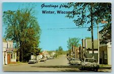 Postcard WI Winter Sawyer County c1960s Main Street View Old Cars D3 picture