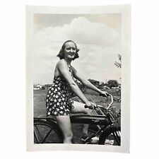 VINTAGE PHOTO 1940s beautiful woman riding bicycle, bike short dress Original picture