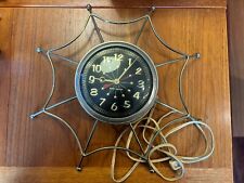 Mid Century Modern New Haven electric wall clock, Sputnik, Brass web surround. picture
