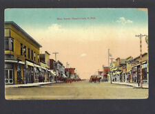 c.1910 Main Street St Chamberlain South Dakota SD Carriages Dry Goods Postcard picture