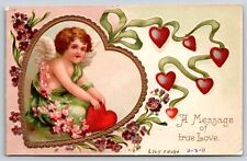 Artist Clapsaddle~Valentine~Cupid In Gold Heart w/Msg Of True Love~Emb~1911 PC picture